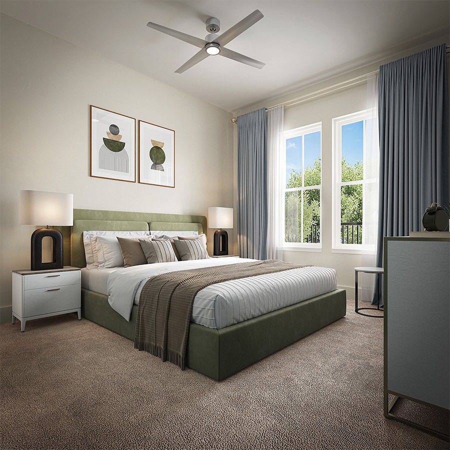 a bedroom with large windows